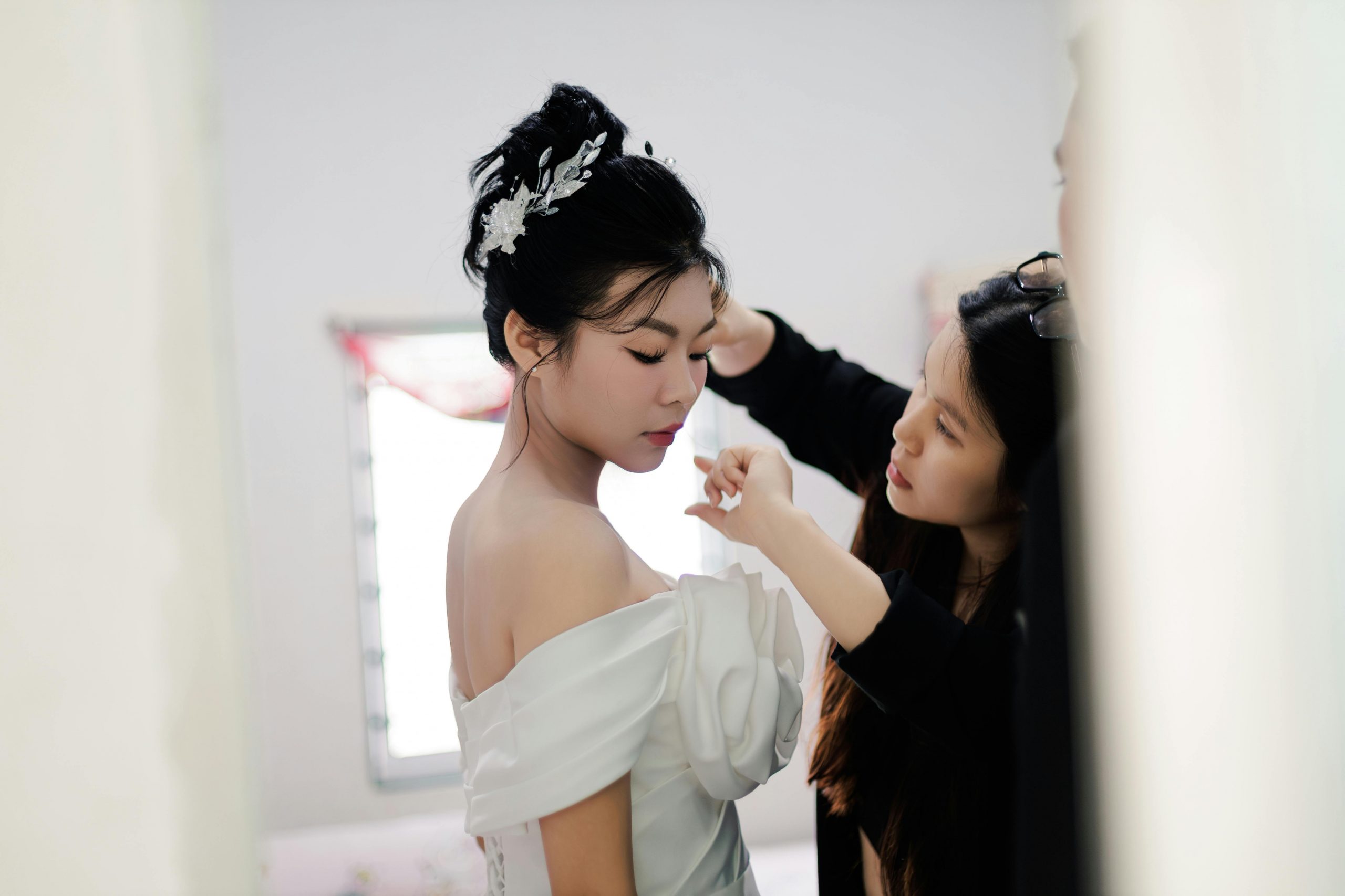 makeup artist and bride